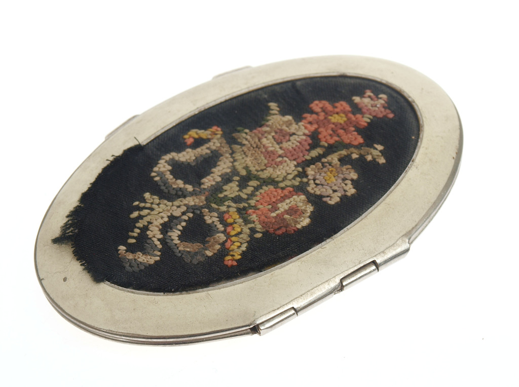 Powder case with embroidery