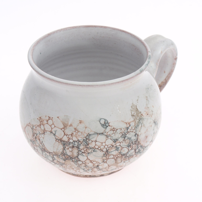 Ceramic cup with saucer