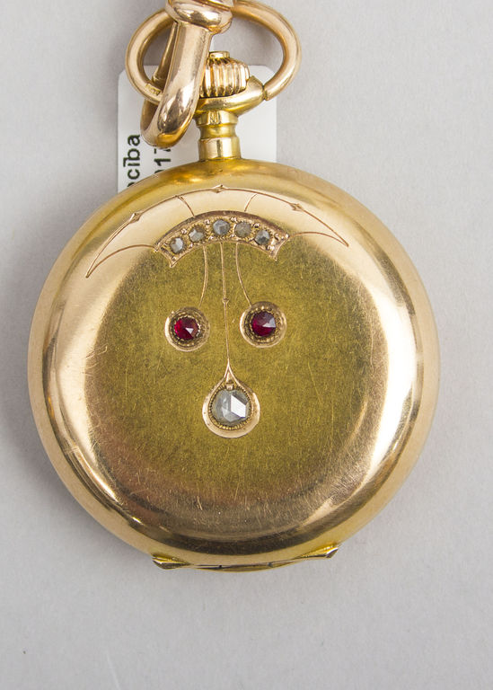 Gold pocket watch with diamonds and rubies and chain