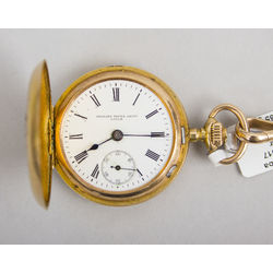Gold pocket watch with diamonds and rubies and chain