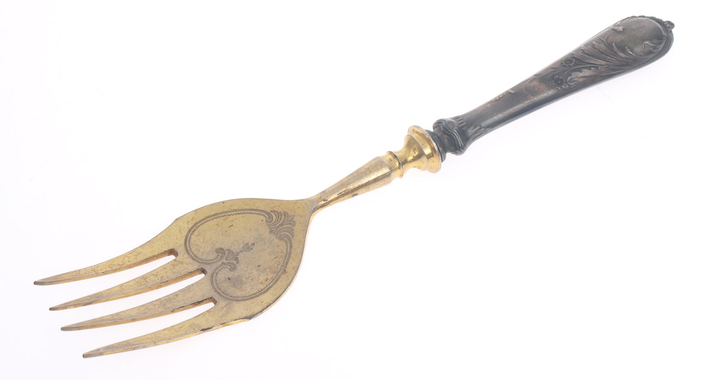 Silver fork with gilding