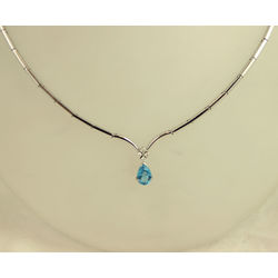 Gold necklace with 4 diamonds and 1 topaz
