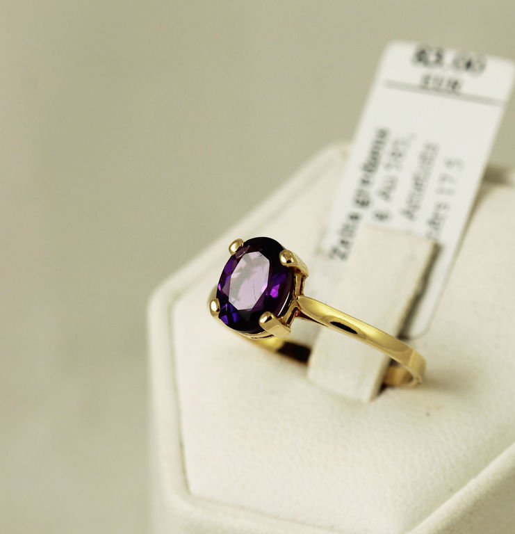 Gold ring with synthetic amethyst