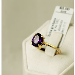 Gold ring with synthetic amethyst