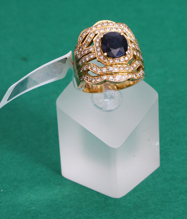 Golden ring with sapphire and brilliants