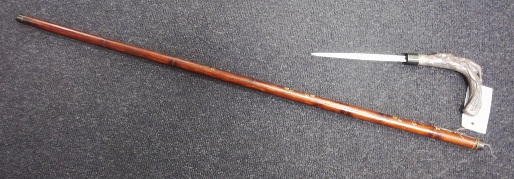Walking stick with a silver finish