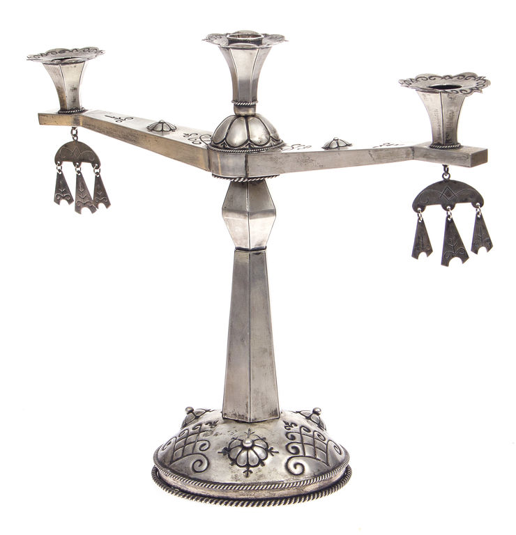 Silver candlestick  with national signs