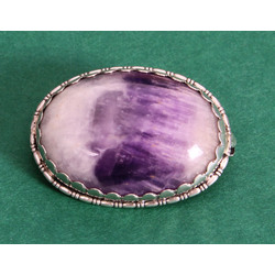 Silver Art Nouveau style brooch with amethyst