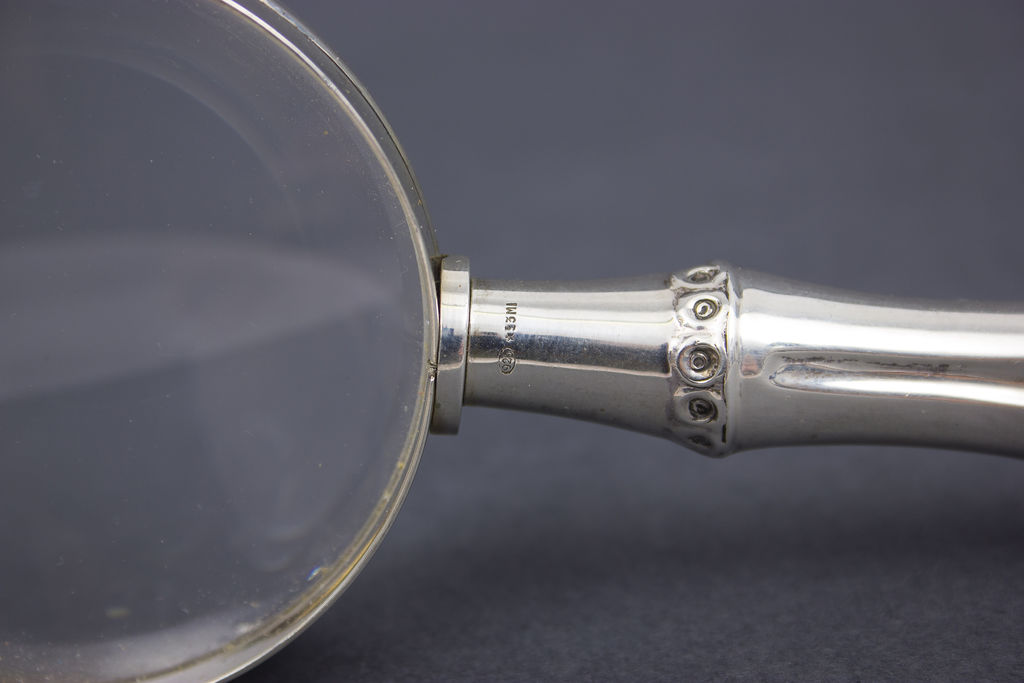 Silver magnifying glass for collectors
