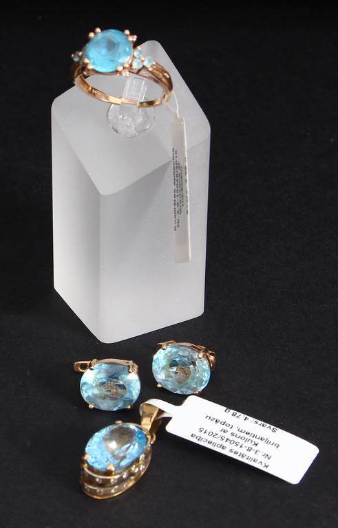 Gold jewelry set with topaz and diamonds
