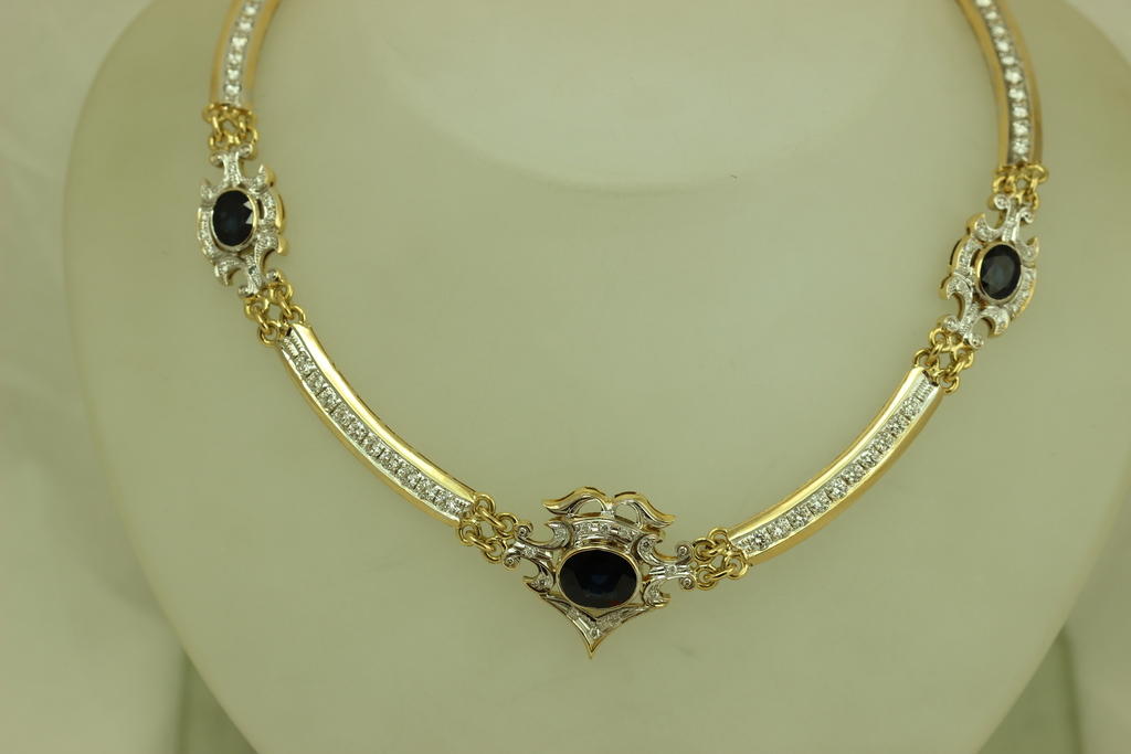 Gold necklace with diamonds and sapphires