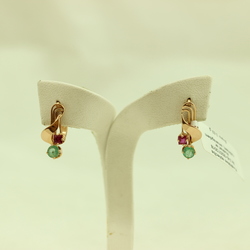Gold earrings with rubies and emeralds