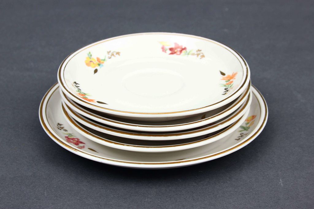 Porcelain saucers and plate (5 pcs.)