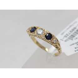 Gold ring with diamonds and 2 sapphires