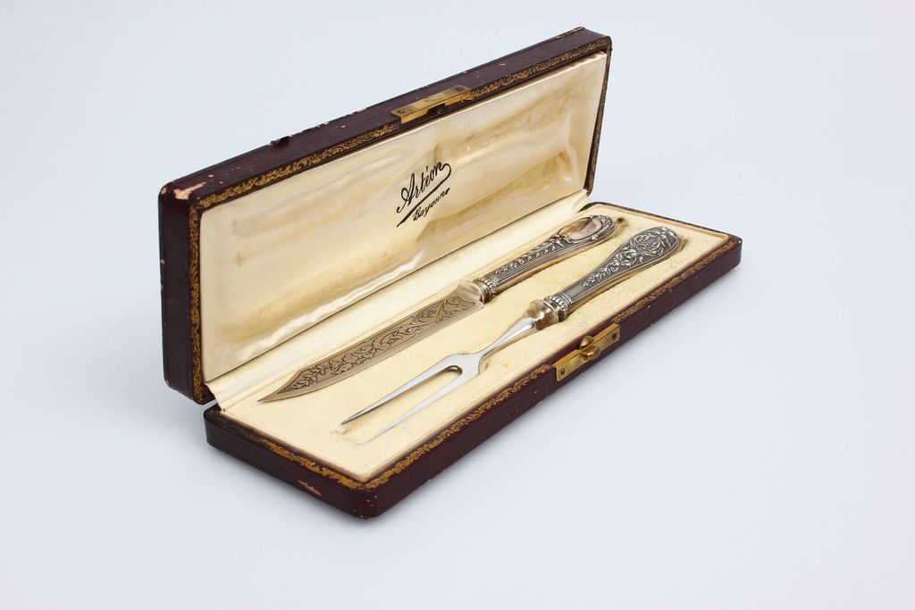 Silver fork and knife in the original box