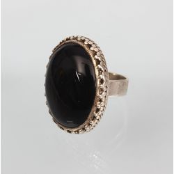 Silver ring with black stone