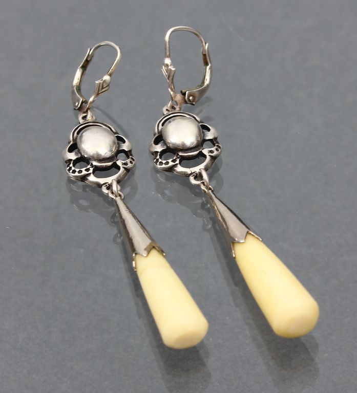 Silver earrings with bone