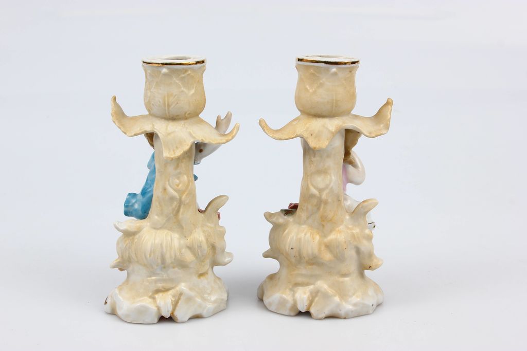 Couple of porcelain candlesticks