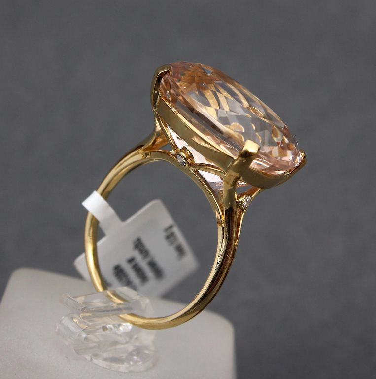 Gold ring with cowboy and diamonds and pink spodum