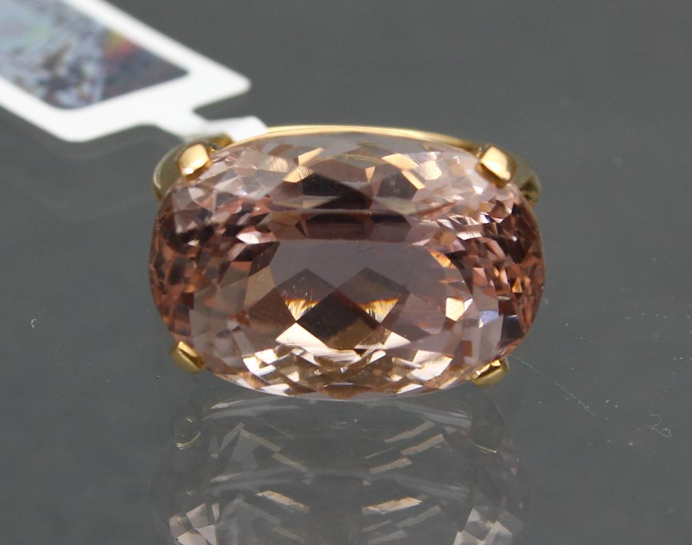 Gold ring with cowboy and diamonds and pink spodum