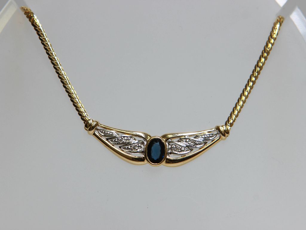 Gold necklace with 4 brilliants, sapphire