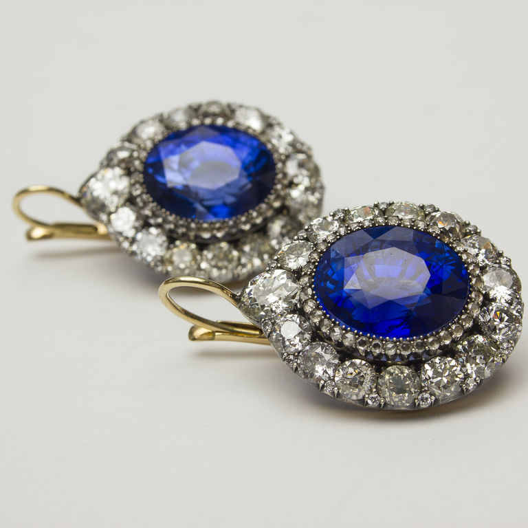 Gold earrings with huge sapphires and128 diamonds  