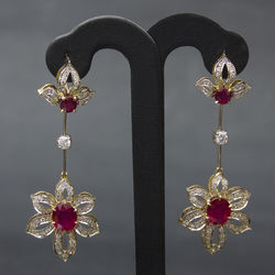 Gold earrings with brilliants and rubies 