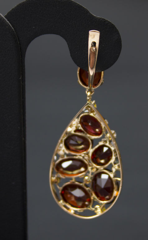 Gold earrings with garnets, diamonds and sapphires