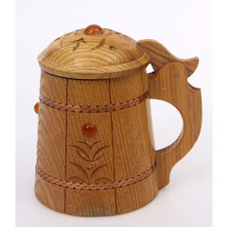 Wooden cup with melted amber
