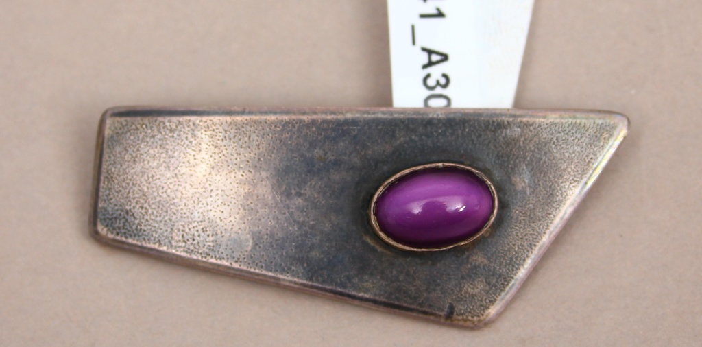 Sterling silver brooch with amethyst