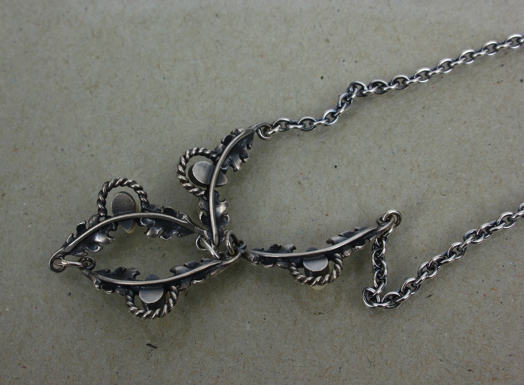 Silver necklace with bone
