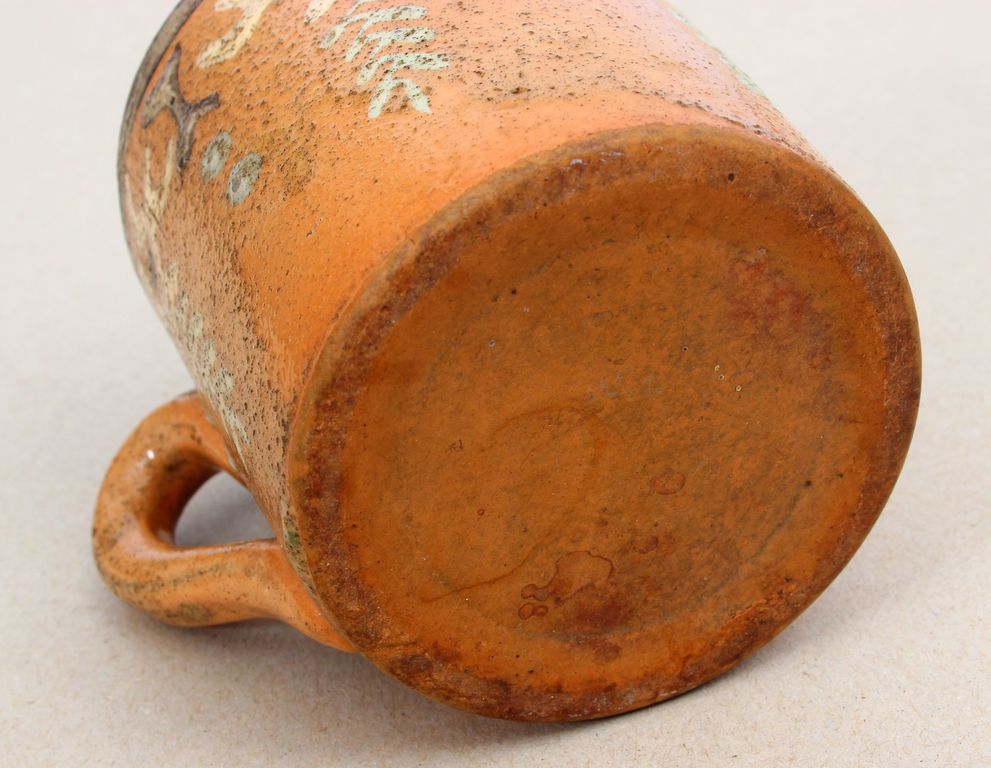Ceramic cup with ornaments