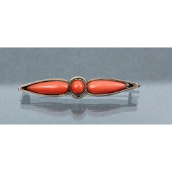 Silver brooch with coral