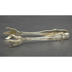 Silver sugar tongs with eagle paws