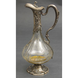 Glass carafe with silver trim