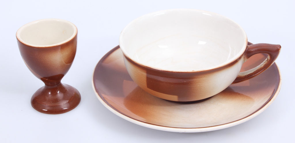 Art-deko style faience cup with saucer and egg holder 