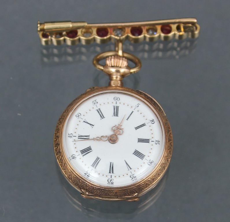 Gold watch with brooch