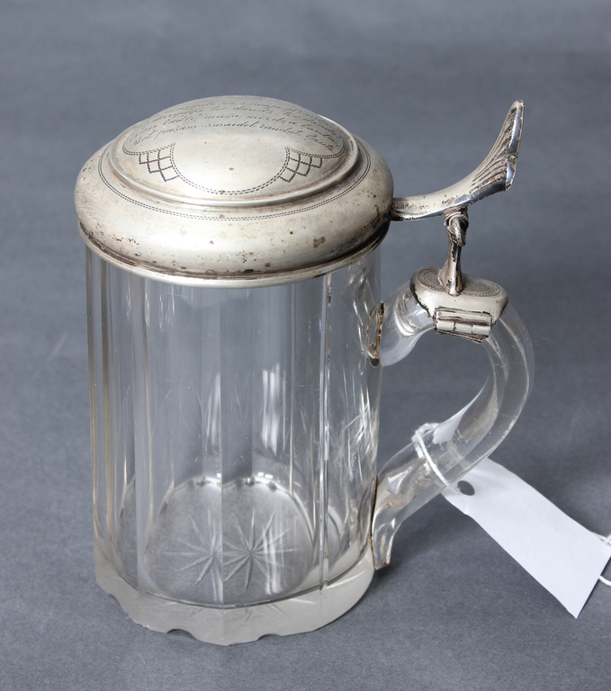 Glass cup with silver lid