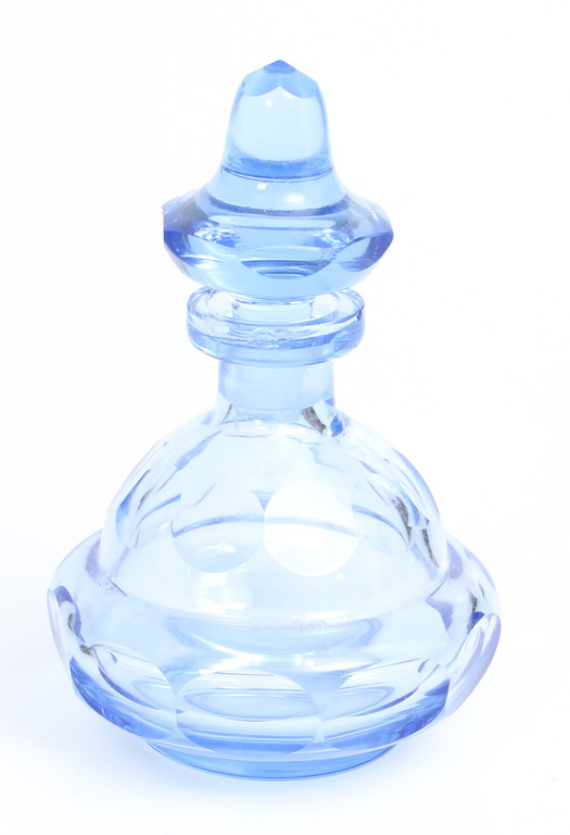 Gaiši zila stikla smaržu pudele