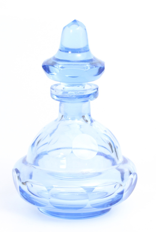 Light blue glass perfume bottle