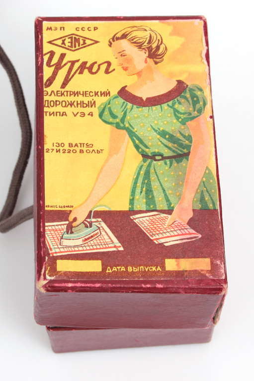 Iron in its original packaging, working