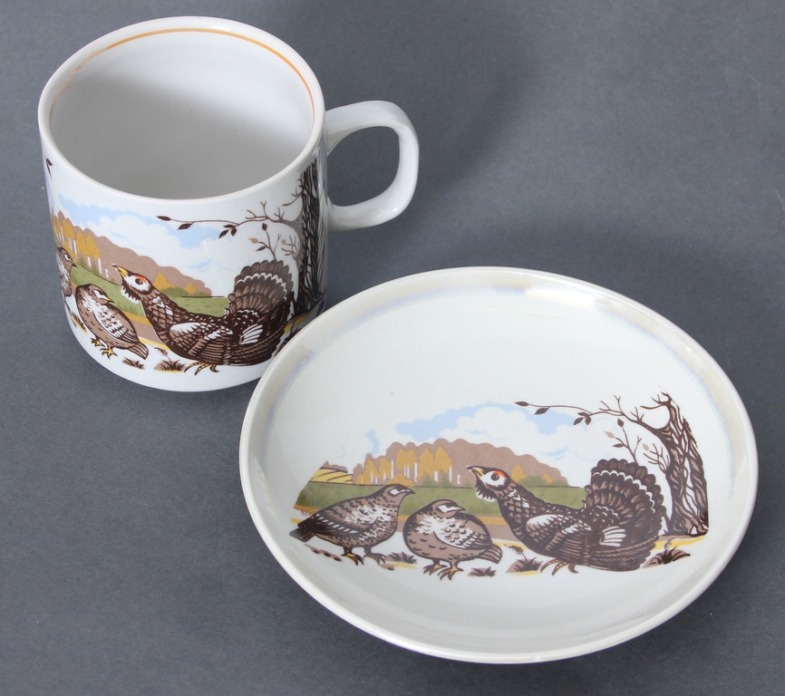 Porcelain mug with saucer 