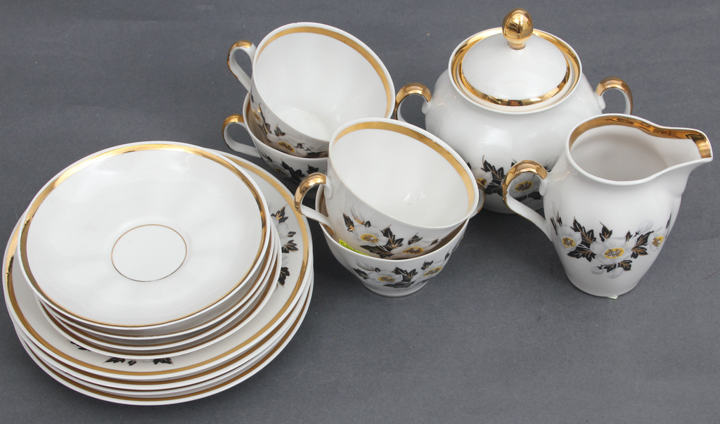 Porcelain serving part - 4 saucers, 4 plates, 4 cups, 1 sugar bowl, 1 cream container