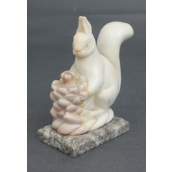 Stone figure on a marble base 