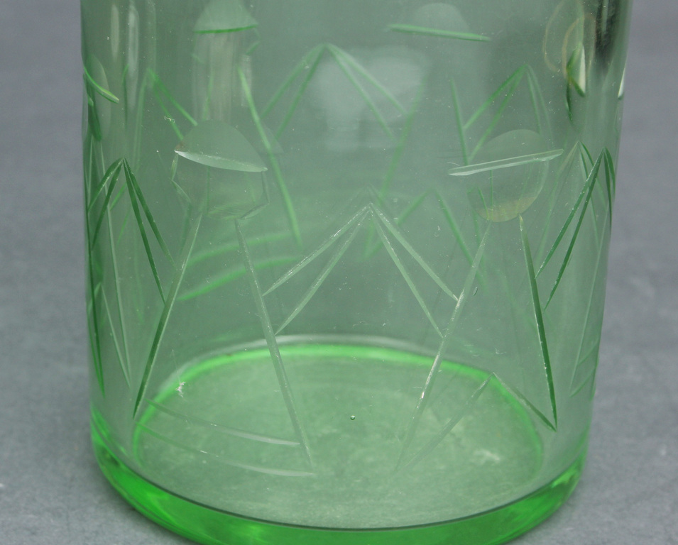 Green glass vase in art deco style