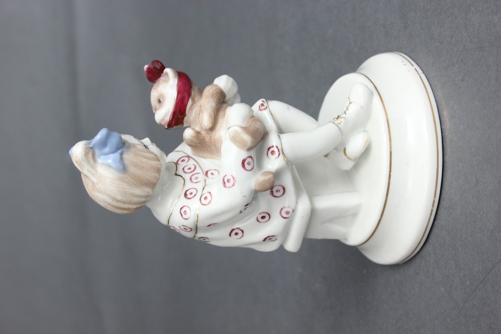 Porcelain figurine Girl with a teddy bear