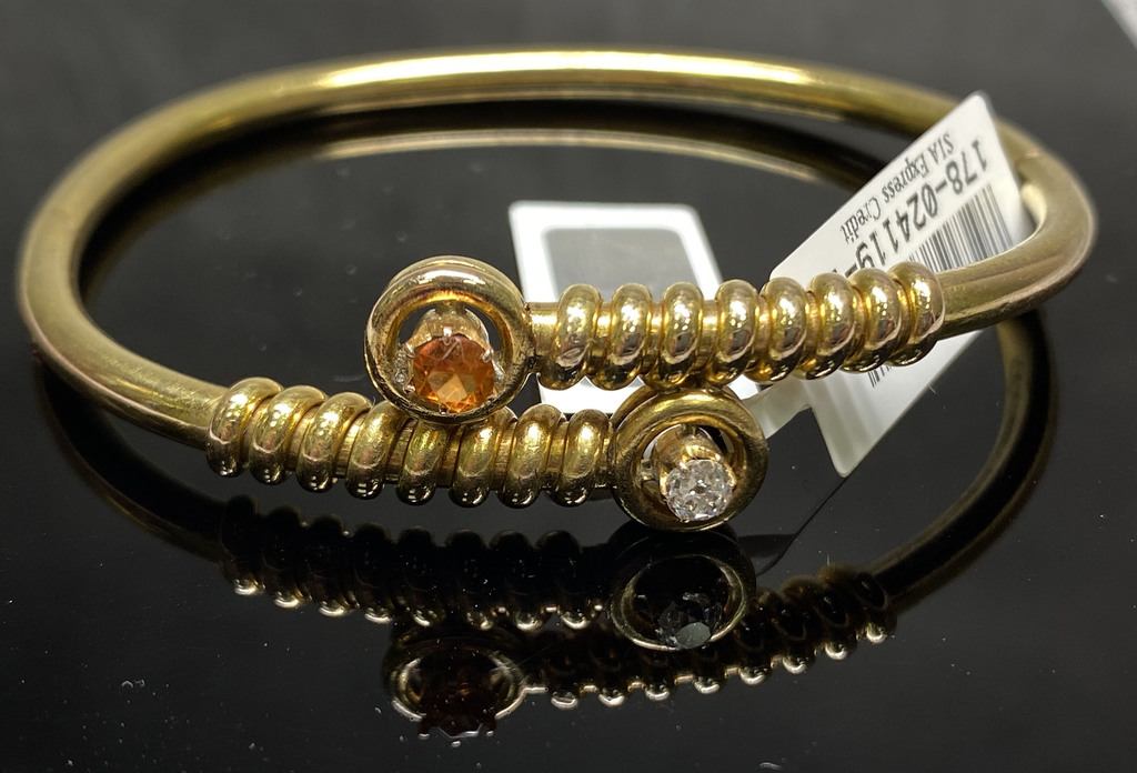 Золотой браслет с бриллиантом и гессонитом