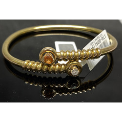 Gold bracelet with diamond and hessonite