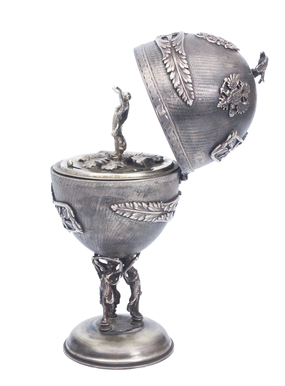 Silver music box in egg form
