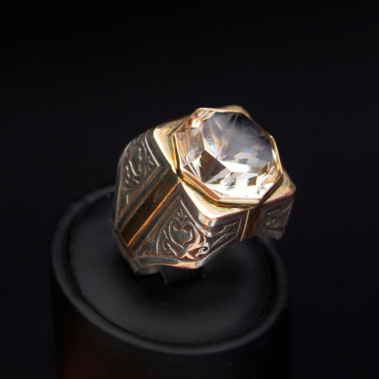 Gold ring with topaz